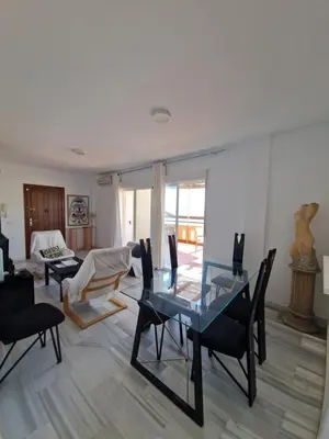 Zona de estar de Bonito ático con vistas al mar