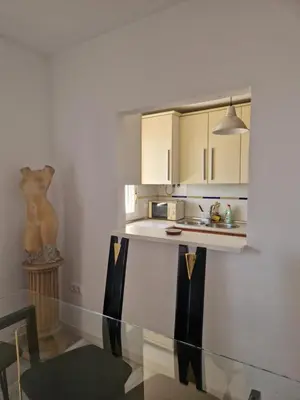 Una cocina o zona de cocina en Bonito ático con vistas al mar