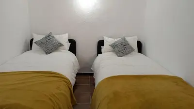 Cama o camas de una habitación en Cueva Murphy - Modern house with 3 cave bedrooms in Orce