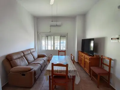 Una televisión o centro de entretenimiento en Apartamentos Cala Enmedio Cabo de Gata