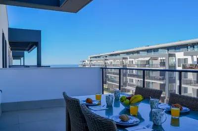 Un balcón o terraza de TrendyHomes Almerimar Beach II, residencial de lujo en primera línea de playa