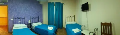 Una televisión o centro de entretenimiento en Casa Rural ENTRESIERRAS