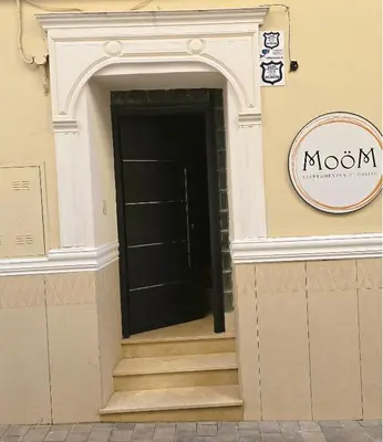 Certificado, premio, señal o documento que está expuesto en Moöm Apartamentos Turísticos