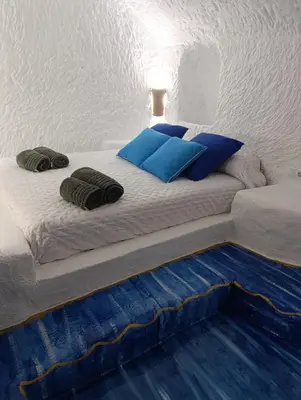 Cama o camas de una habitación en Cueva Doña Bona