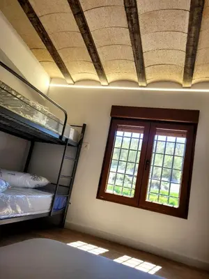 Cama o camas de una habitación en Casa Rural Motos