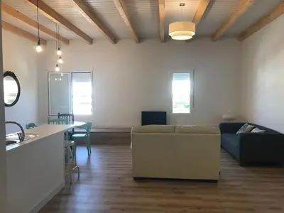 Una televisión o centro de entretenimiento en Live Cabo de Gata