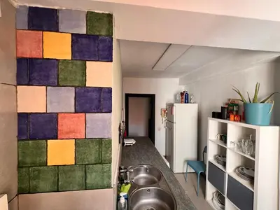 Una cocina o zona de cocina en La Casa del Musico 3