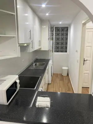 Una cocina o zona de cocina en Apartamento Torrelaguna Las Marinas,Vera -250 m Playa - 2 Dormitorios - Piscina - Mascotas
