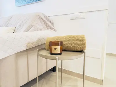 Cama o camas de una habitación en Casa del Sol - Casa familiar junto a la playa con vistas al mar en Almería