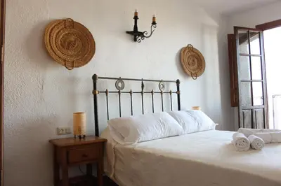 Cama o camas de una habitación en Alojamientos y habitaciones Rurales Alpujarra - Piscina, Barbacoa y Terraza con Preciosas Vistas