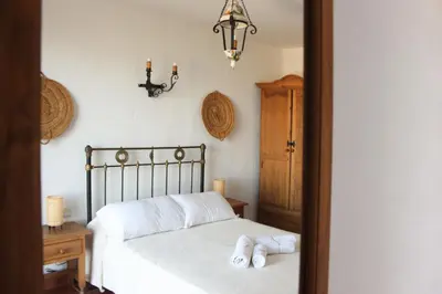 Cama o camas de una habitación en Alojamientos y habitaciones Rurales Alpujarra - Piscina, Barbacoa y Terraza con Preciosas Vistas