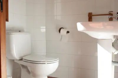 Un baño de Alojamientos y habitaciones Rurales Alpujarra - Piscina, Barbacoa y Terraza con Preciosas Vistas