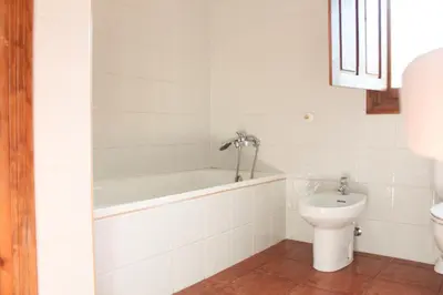 Un baño de Alojamientos y habitaciones Rurales Alpujarra - Piscina, Barbacoa y Terraza con Preciosas Vistas