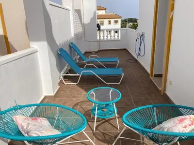 Un balcón o terraza de Cozy townhouse in Vera, just steps from the beach