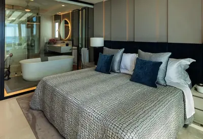 Cama o camas de una habitación en Beachfront apartamento in san josé