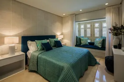 Cama o camas de una habitación en Beachfront apartamento in san josé