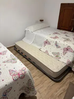 Cama o camas de una habitación en Rufina casa rural con bañera hidromasaje
