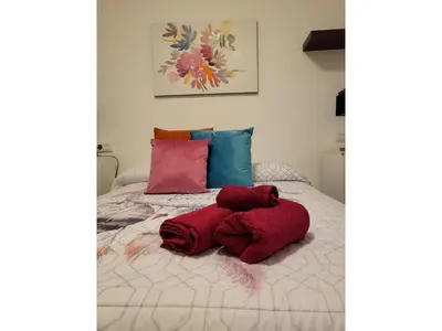 Cama o camas de una habitación en Apartment with large terrace in Almeria