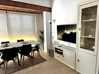 Una televisión o centro de entretenimiento en Aguilas Home Beach by Joan