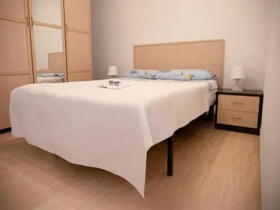 Cama o camas de una habitación en Vacation Apartment in Roquetas de Mar