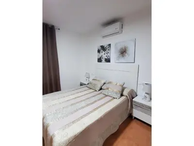 Cama o camas de una habitación en Getaway in Vera Apartment in Natura World