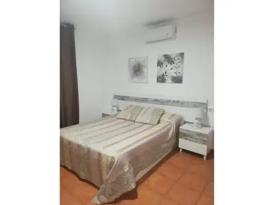 Cama o camas de una habitación en Getaway in Vera Apartment in Natura World
