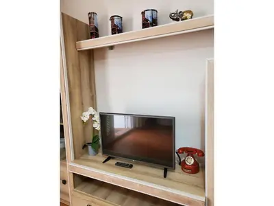 Una televisión o centro de entretenimiento en Getaway in Vera Apartment in Natura World