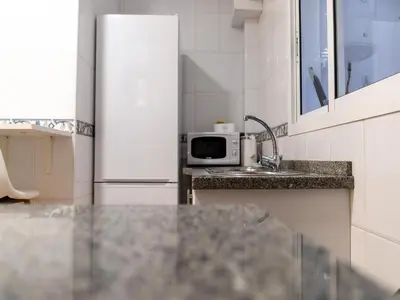 Una cocina o zona de cocina en Beautiful apartment by the sea in Almeria