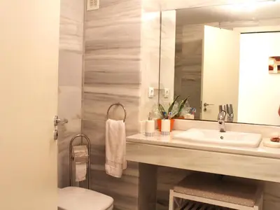 Un baño de Junto al Mar