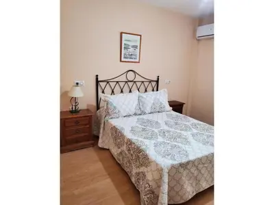 Cama o camas de una habitación en Beachfront apartment in Nautrist Resort
