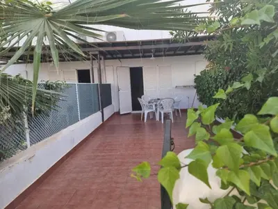 Un balcón o terraza de Beachfront apartment in Nautrist Resort