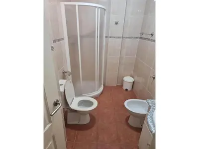 Un baño de Beachfront apartment in Nautrist Resort