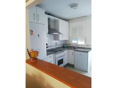 Una cocina o zona de cocina en cozy vacation apartment in Vera
