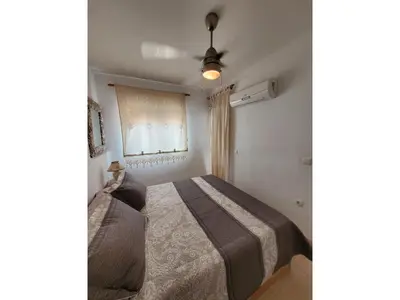 Cama o camas de una habitación en cozy vacation apartment in Vera