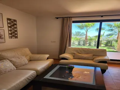 Zona de estar de Charming apartment with garden in Almeria