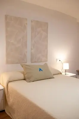 Cama o camas de una habitación en La bodega de la Yaya