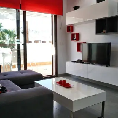 Una televisión o centro de entretenimiento en Casa Alexandra
