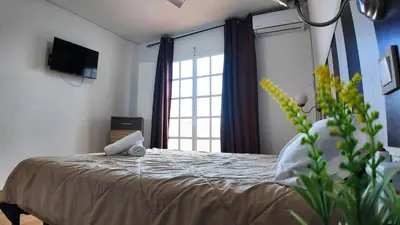 Cama o camas de una habitación en Apartalux Diamond Oasis