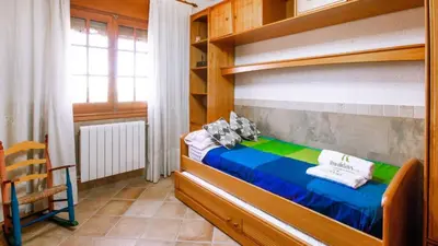 Cama o camas de una habitación en Villa Vera by Ruralidays