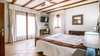 Cama o camas de una habitación en Villa Vera by Ruralidays