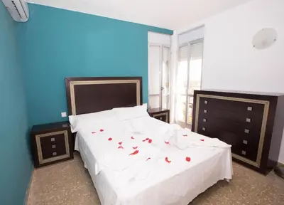 Cama o camas de una habitación en Apartalux Almerimar Beach