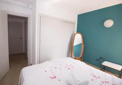 Cama o camas de una habitación en Apartalux Almerimar Beach