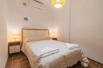 Cama o camas de una habitación en El Carmen - Villa Rural con Piscina Privada y Patio Andaluz