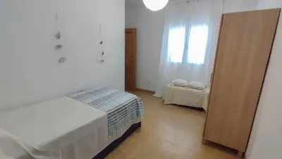 Cama o camas de una habitación en Atico con vistas al mar by Expoholidays
