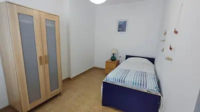 Cama o camas de una habitación en Atico con vistas al mar by Expoholidays