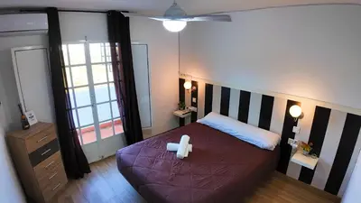 Cama o camas de una habitación en Apartalux Gold Oasis