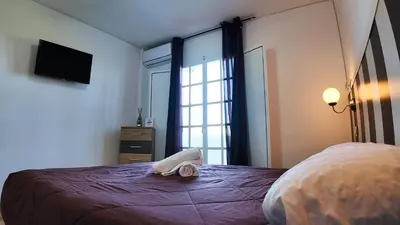 Cama o camas de una habitación en Apartalux Gold Oasis