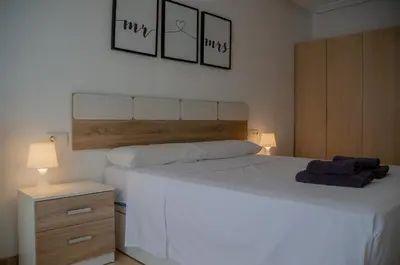 Cama o camas de una habitación en TrendyHomes Buenavista Paseo Marítimo II