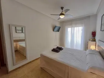 Cama o camas de una habitación en TrendyHomes Buenavista Paseo Marítimo II