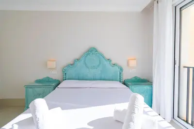 Cama o camas de una habitación en Terraza Las Delicias con parking - By Aloha Palma